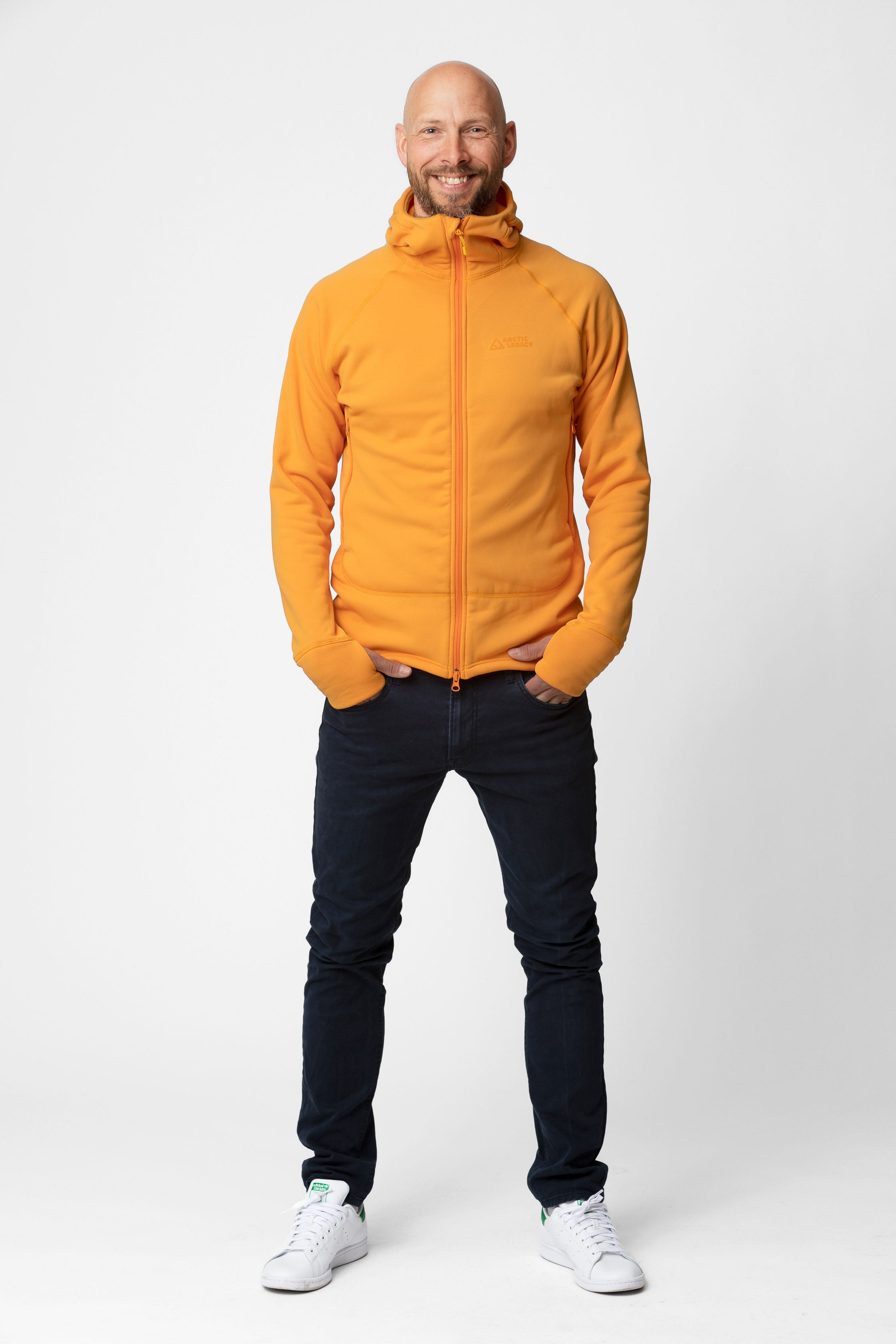 Men's orange yellow fleece jacket - full body front view of the Arctic Legacy Nanuk Pro Fleece Hoodie#color_zinnia