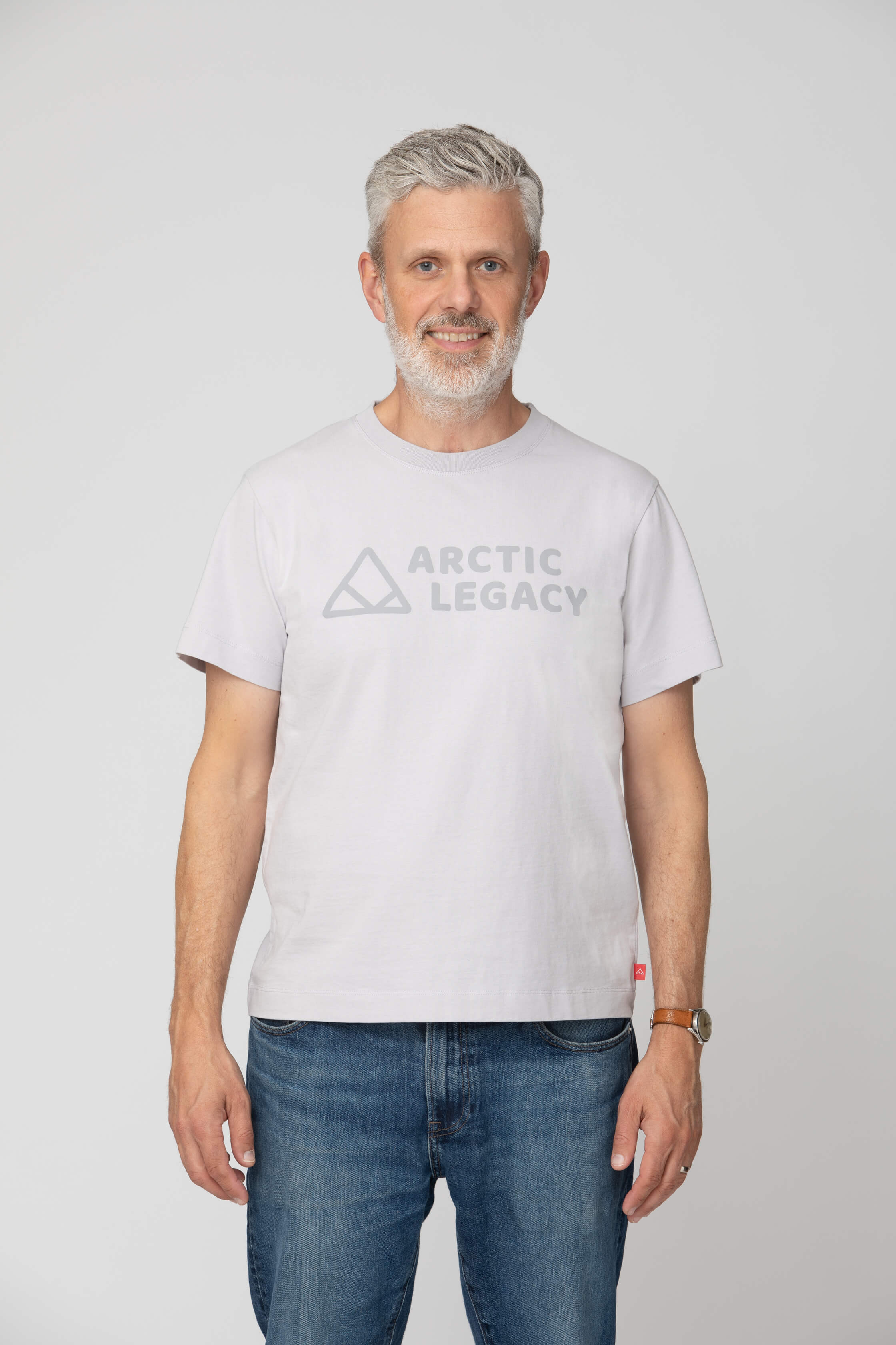 Men's grey t-shirt - front view of the Arctic Legacy Milo Organic Tee#color_northern-droplet