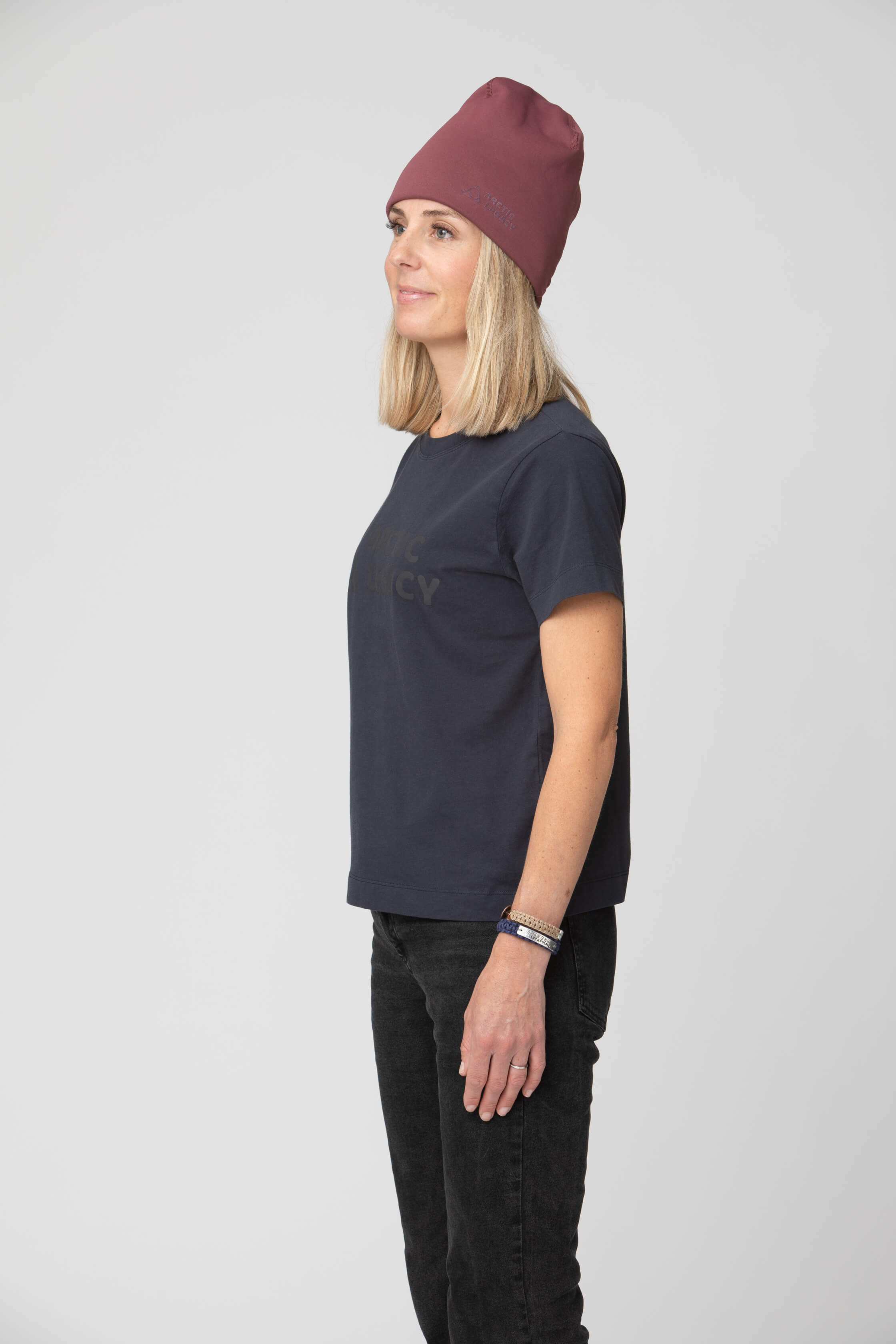 Women's blue t-shirt - side view of the Arctic Legacy Milo Organic Tee#color_dark-navy