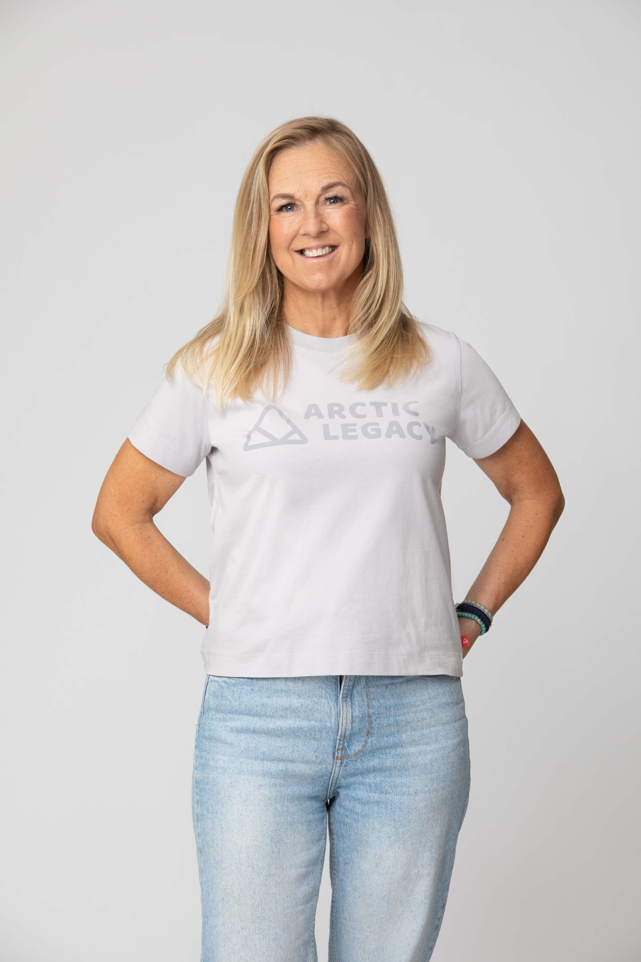 Women's grey t-shirt - front view of the Arctic Legacy Milo Organic Tee#color_northern-droplet