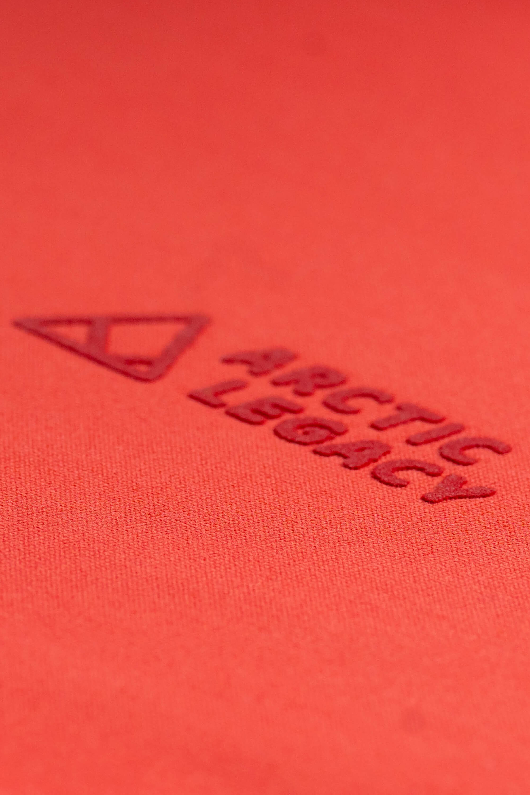 Pink red fleece hat - close-up view of the Arctic Legacy Nova Dual Layer Beanie#color_cayenne