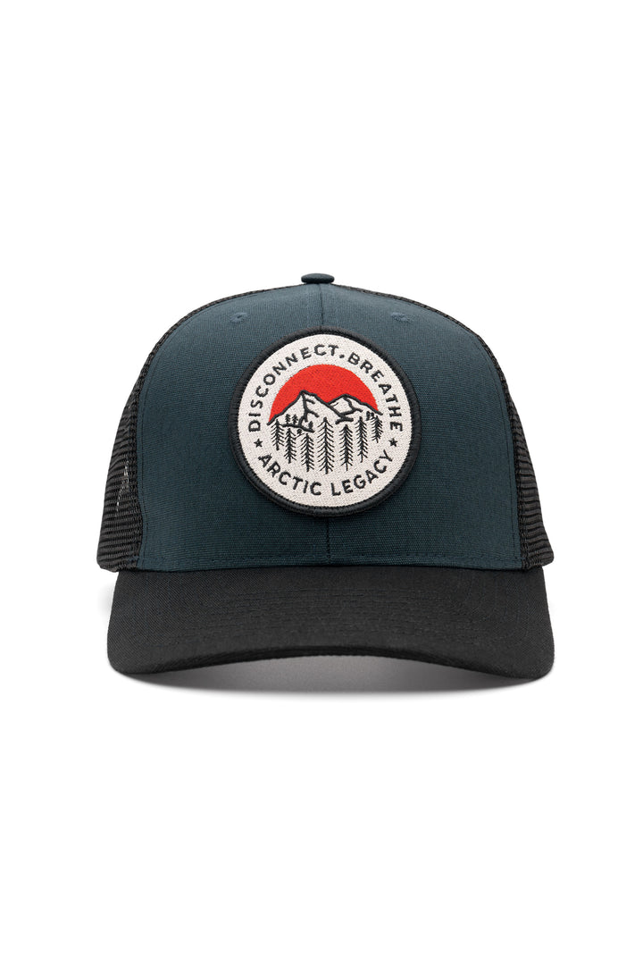 Blue and black trucker hat - front view of the Arctic Legacy Europe Trucker Hat#color_night-blue-black