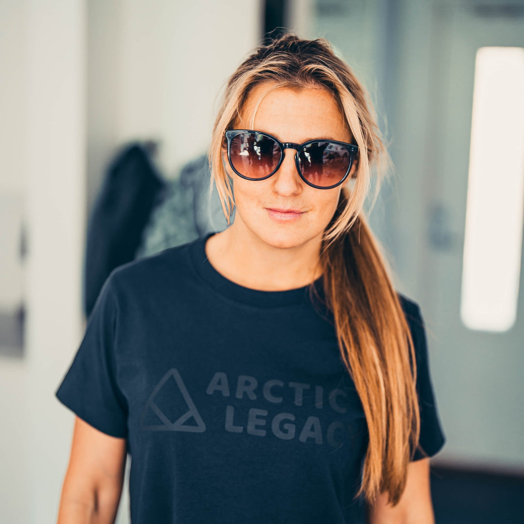 Women's blue t-shirt - front view of the Arctic Legacy Milo Organic Tee#color_dark-navy