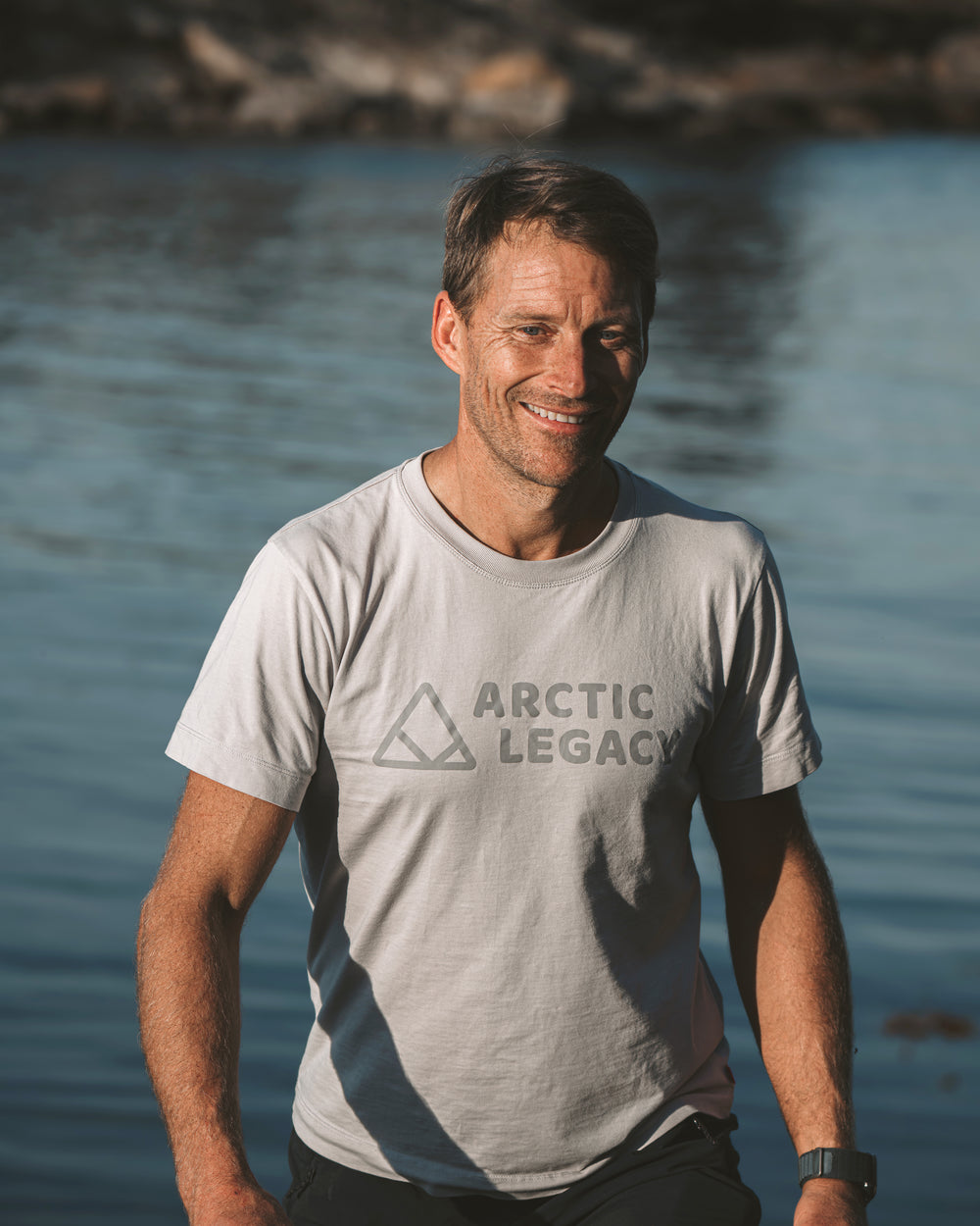 Men's grey t-shirt - front view of the Arctic Legacy Milo Organic Tee#color_northern-droplet