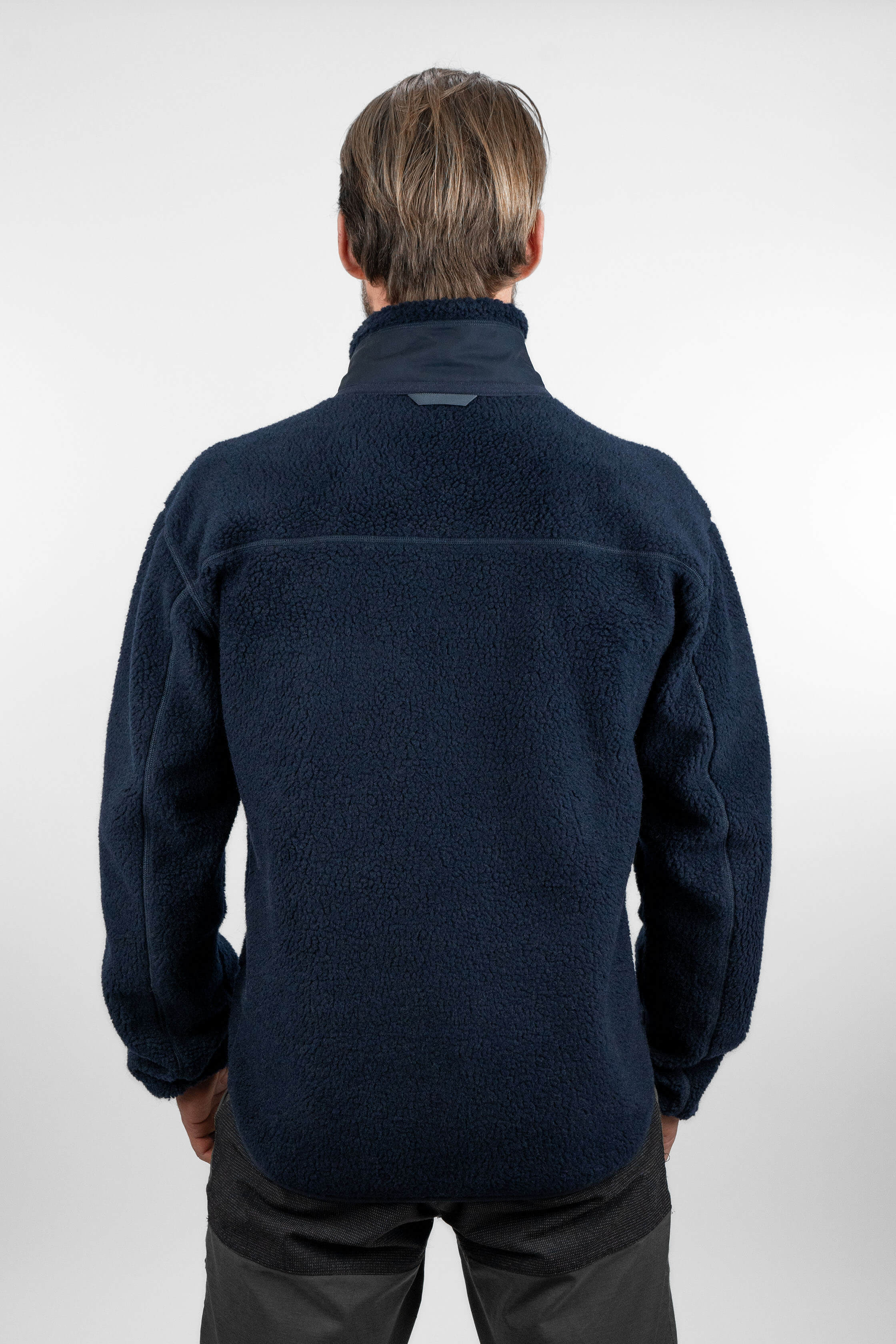 Men's blue pile fleece jacket - back view of the Arctic Legacy Kima Explorer Pile Jacket#color_indigo-blue