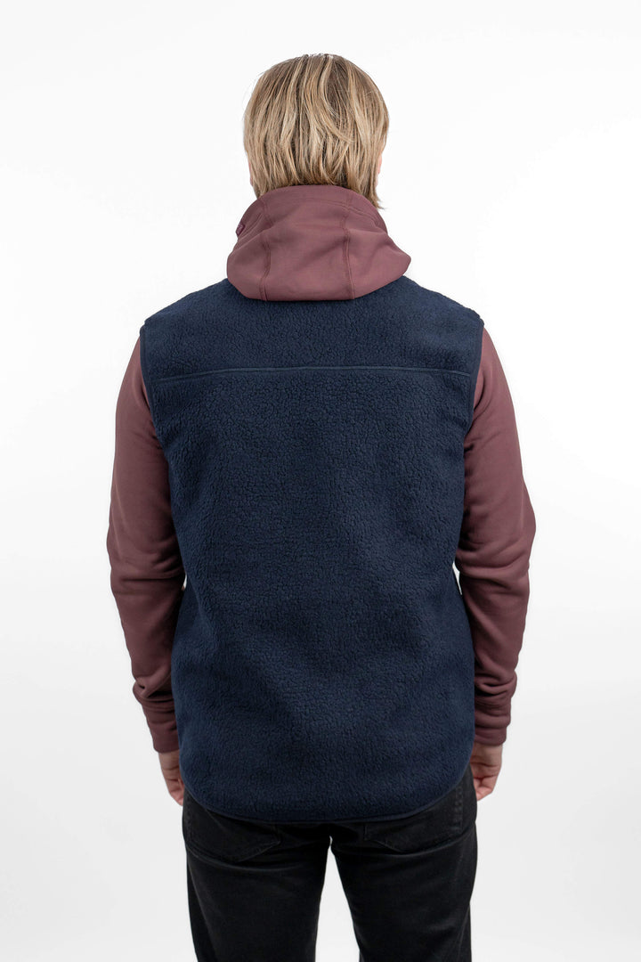 Men's blue pile fleece vest - back view of the Arctic Legacy Kima Explorer Pile Vestt#color_indigo-blue