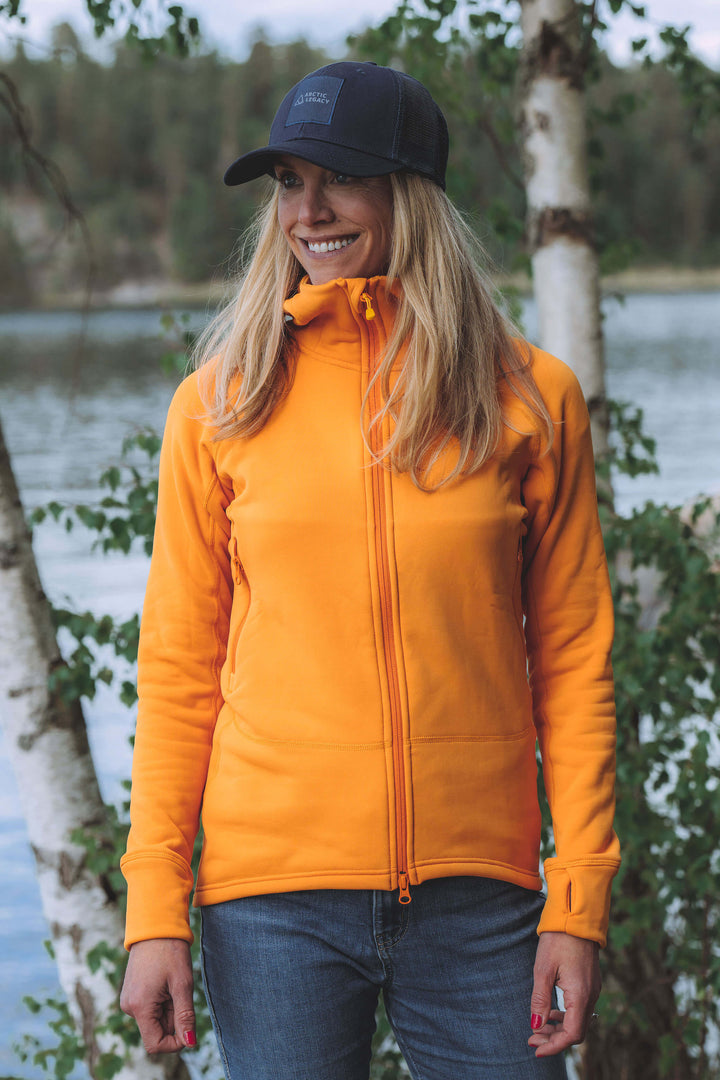 Women's orange yellow fleece jacket - front view of the Arctic Legacy Nanuk Pro Fleece Hoodie#color_zinnia