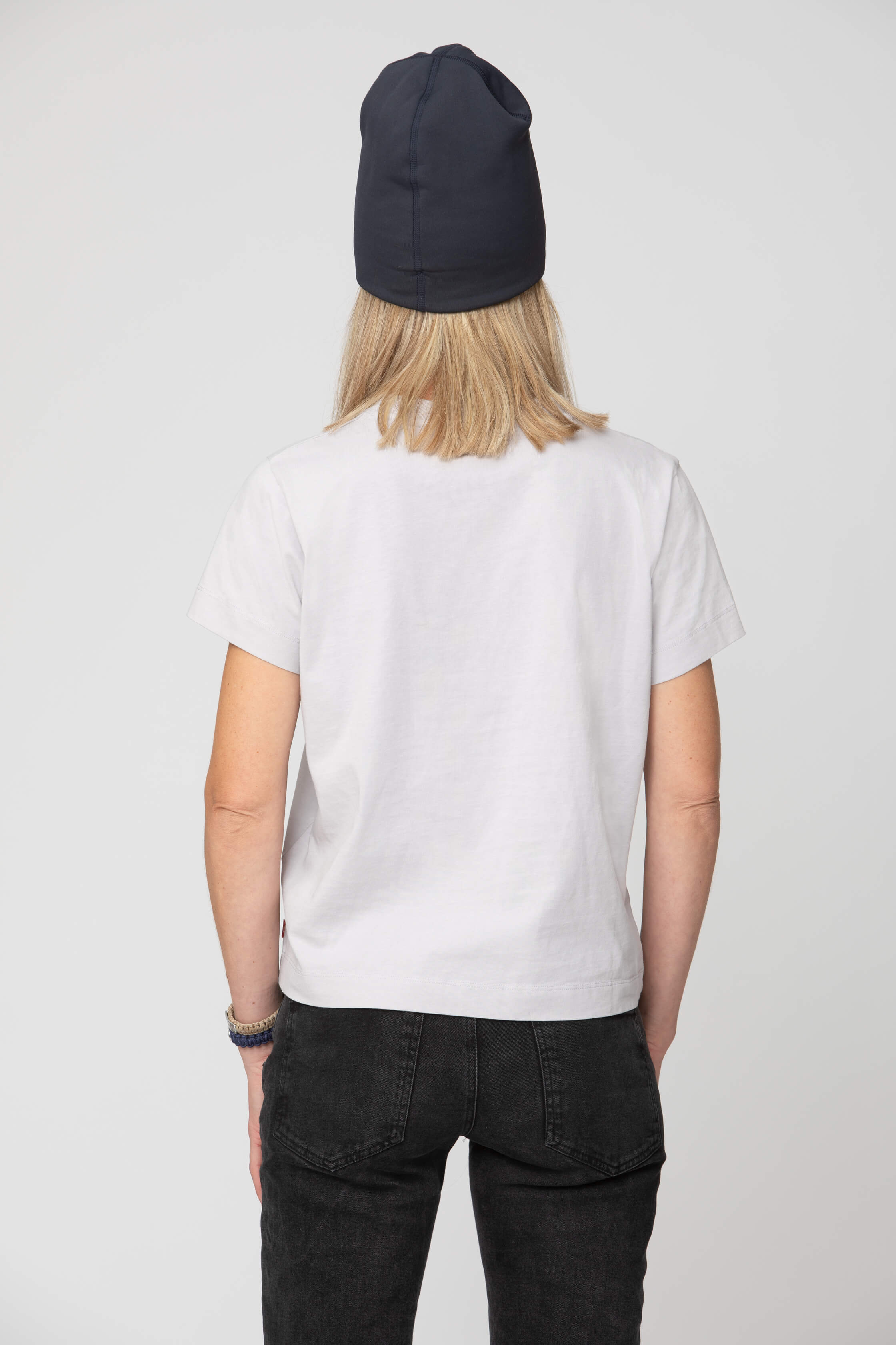 Women's grey t-shirt - back view of the Arctic Legacy Milo Organic Tee#color_northern-droplet