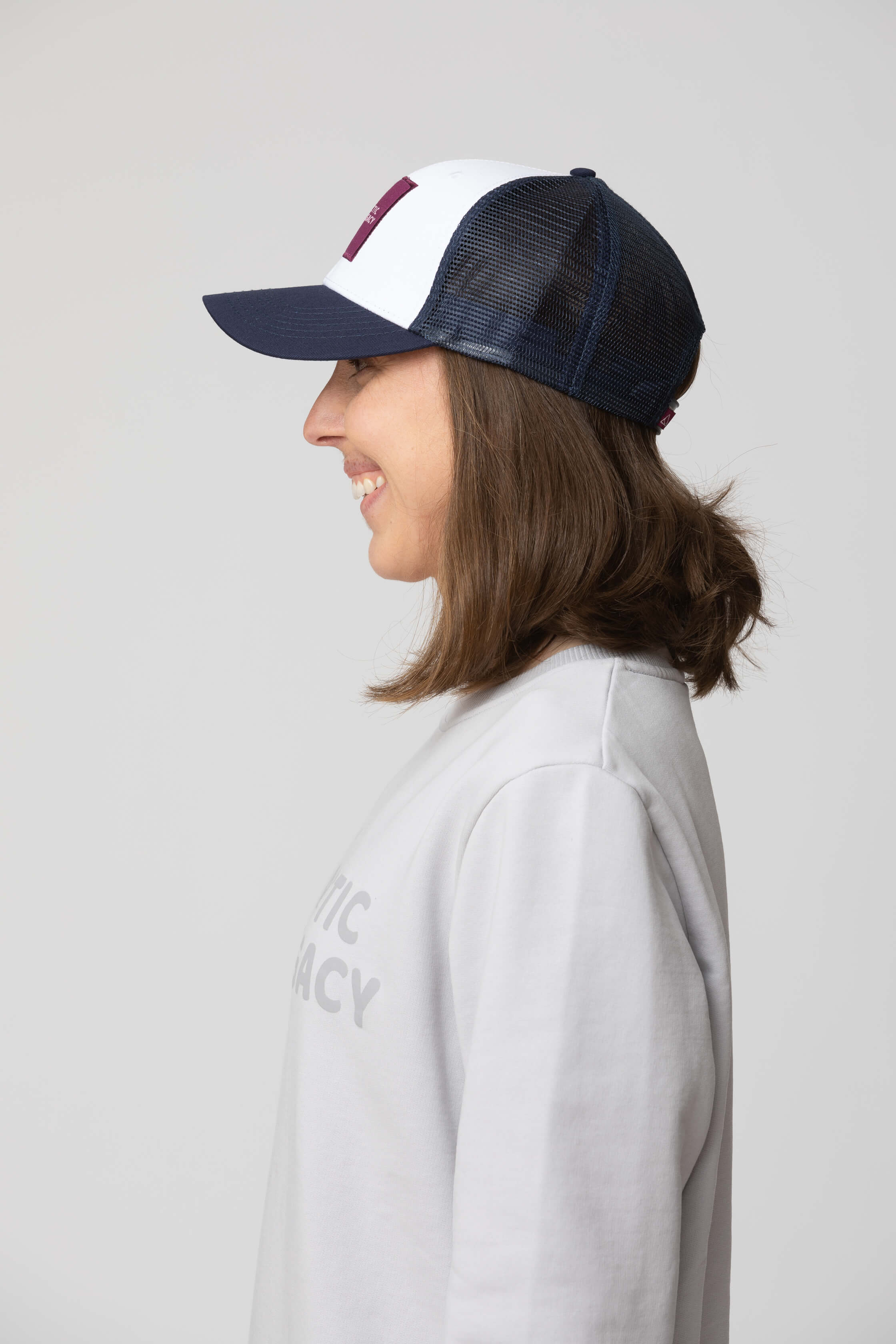 Blue and white trucker hat - side view of the Arctic Legacy Cypress Trucker#color_blue-white-purple