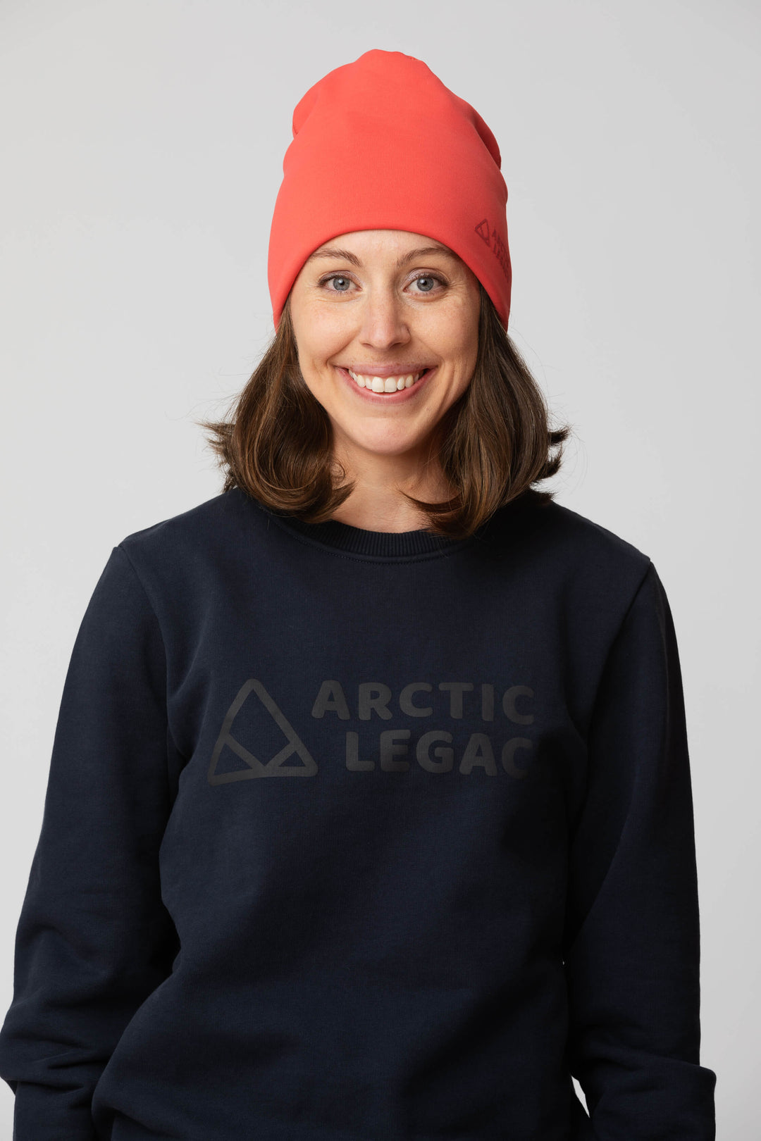 Pink red fleece hat - front view of the Arctic Legacy Nova Dual Layer Beanie#color_cayenne