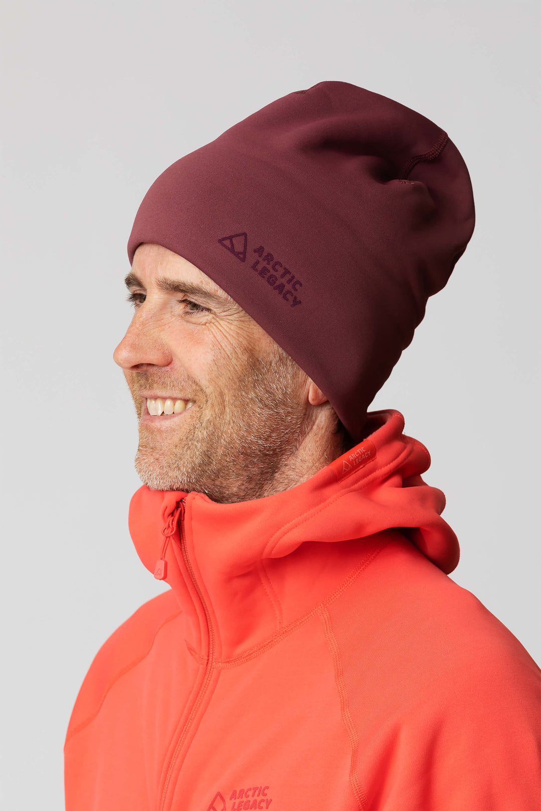 Purple fleece hat - side view of the Arctic Legacy Nova Dual Layer Beanie#color_crushed-berry