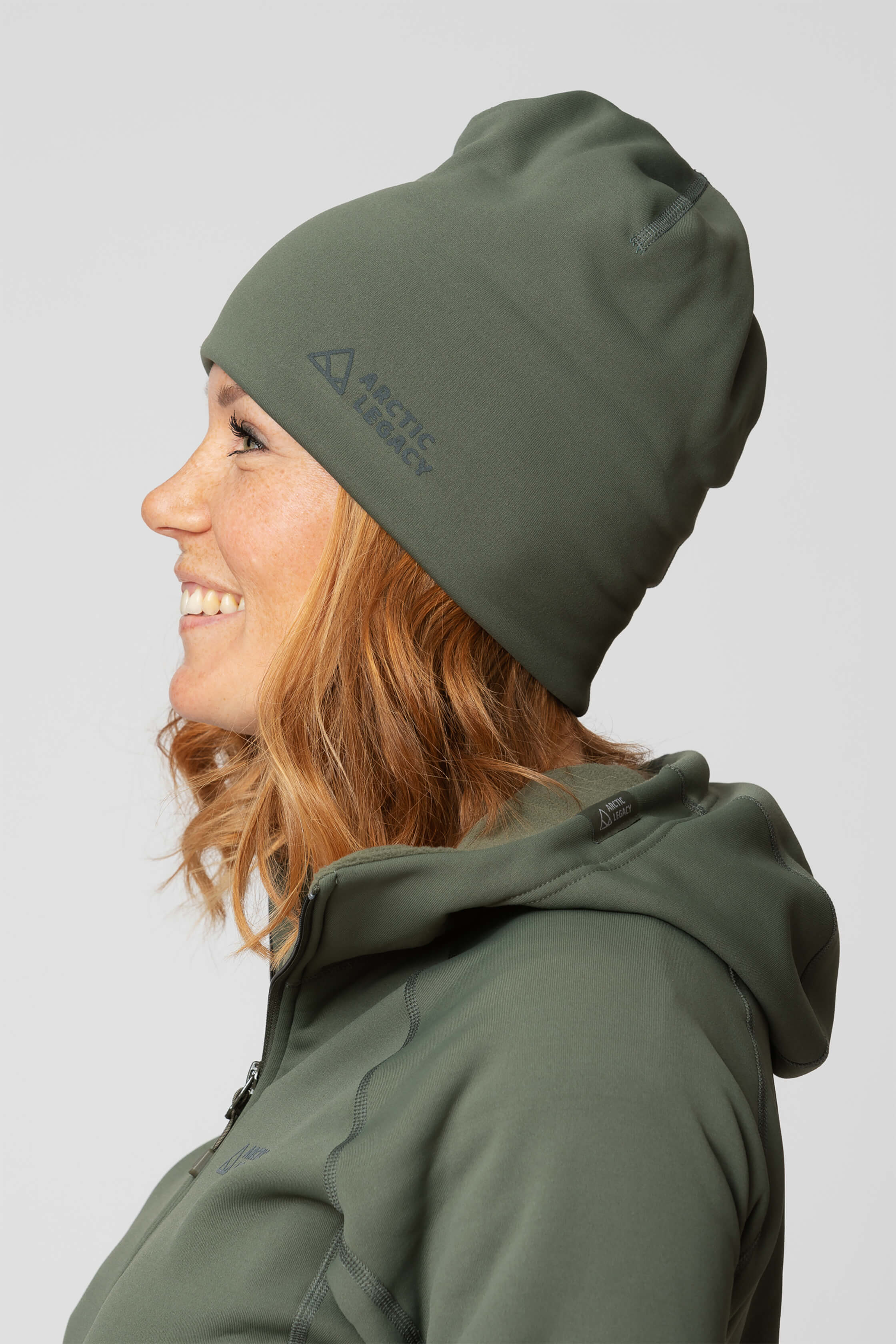Green fleece hat - side view of the Arctic Legacy Nova Dual Layer Beanie#color_dusty-olive