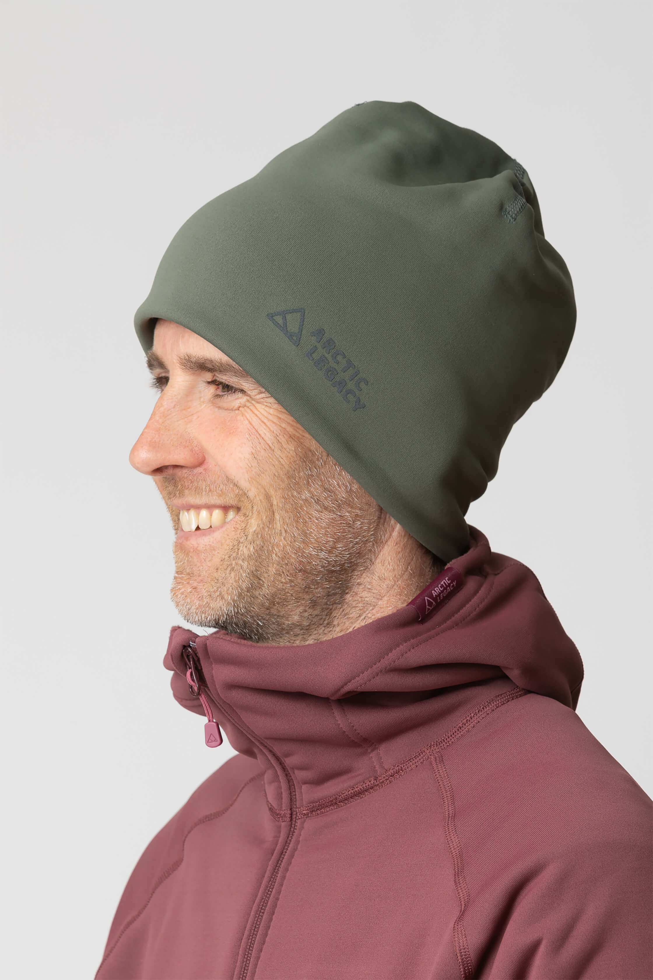Green fleece hat - side view of the Arctic Legacy Nova Dual Layer Beanie#color_dusty-olive