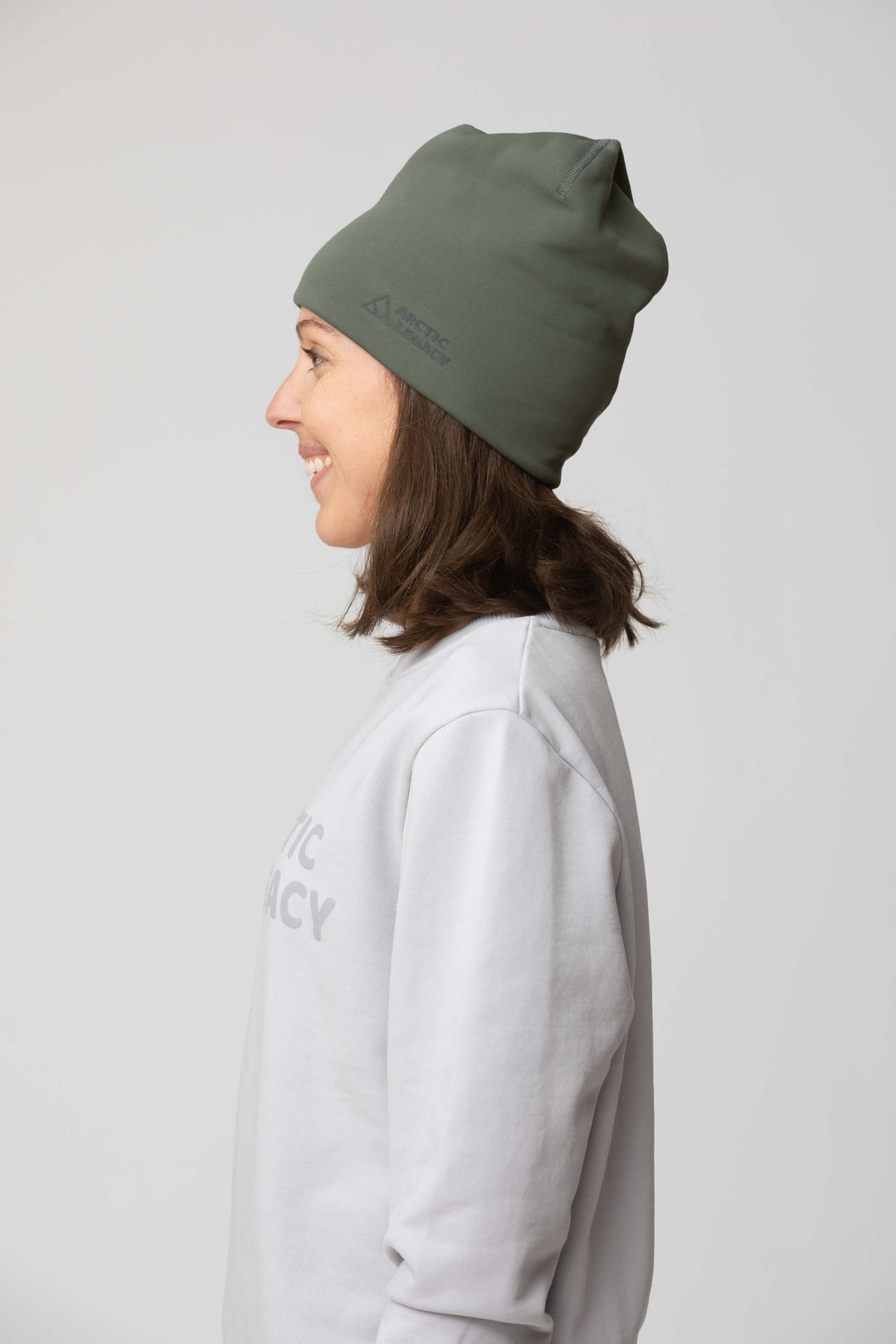 Green fleece hat - side view of the Arctic Legacy Nova Dual Layer Beanie#color_dusty-olive