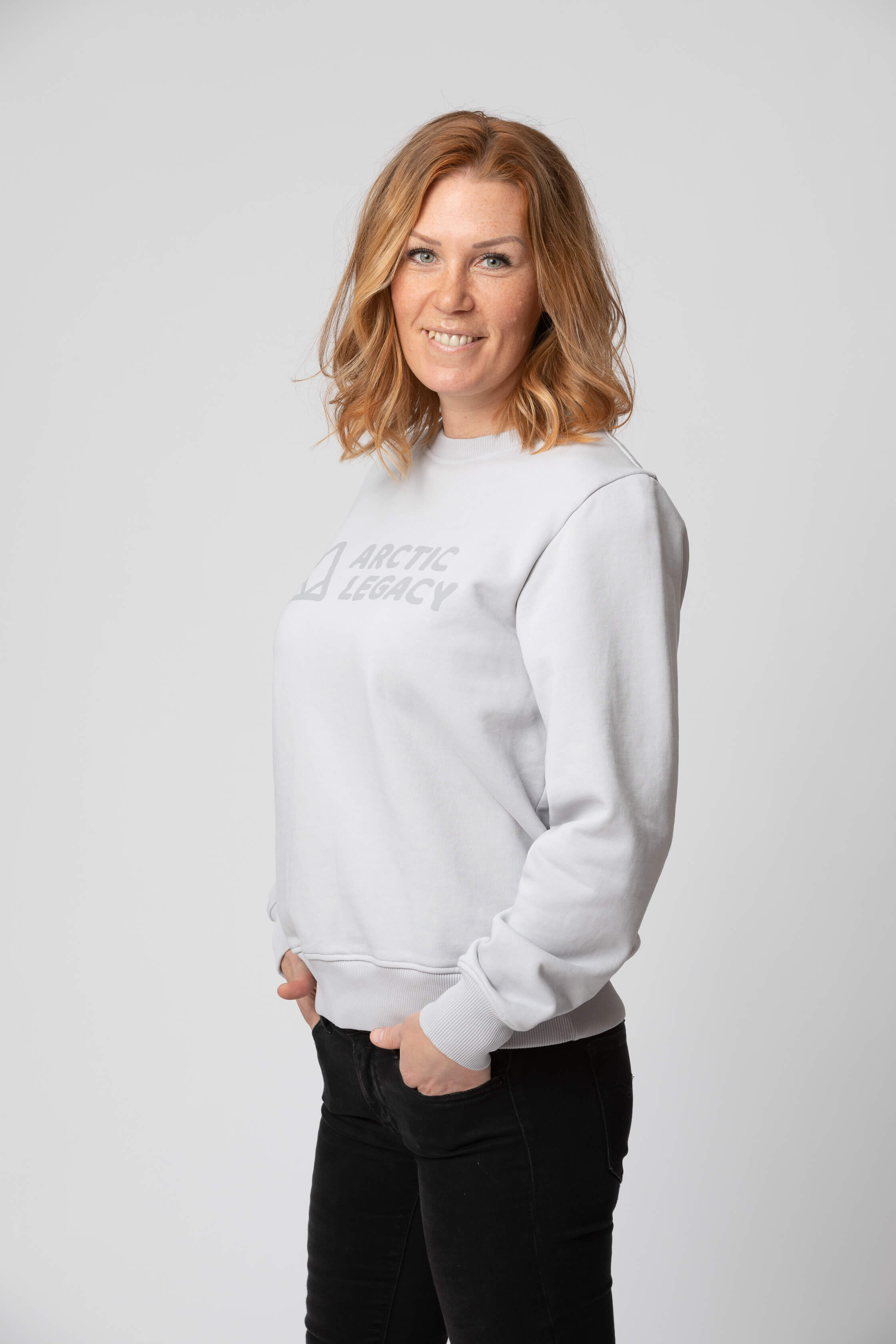 Women’s grey sweatshirt - side view of the Arctic Legacy Ember Organic Crew Sweater#color_northern-droplet