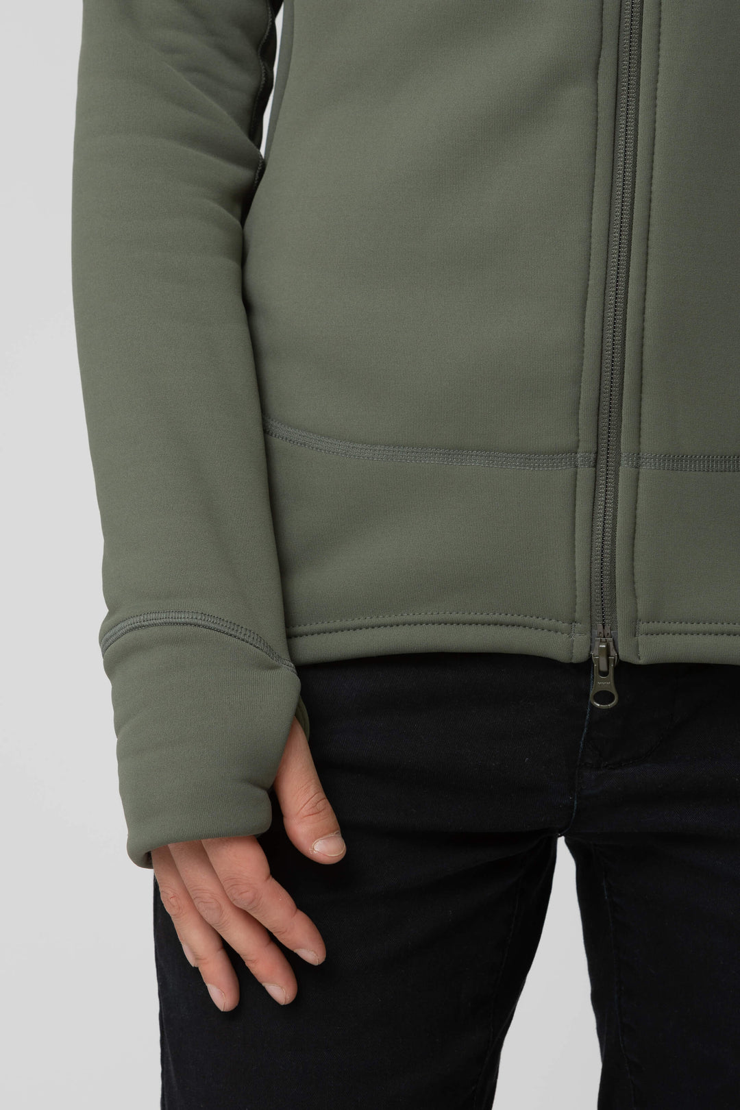 Women's green fleece jacket - wrist view of the Arctic Legacy Nanuk Pro Fleece Hoodie#color_dusty-olive