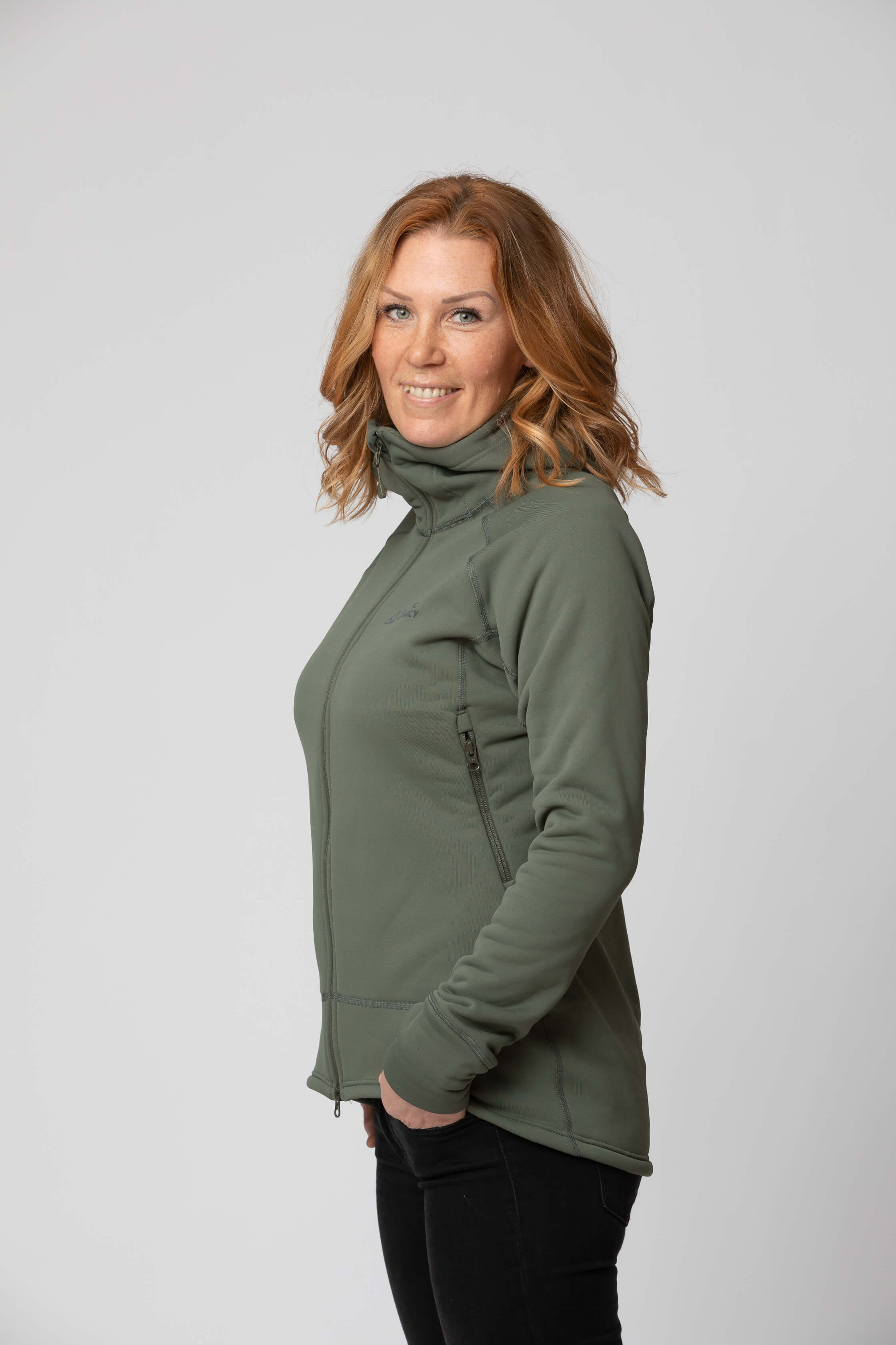 Women's green fleece jacket - side view of the Arctic Legacy Nanuk Pro Fleece Hoodie#color_dusty-olive